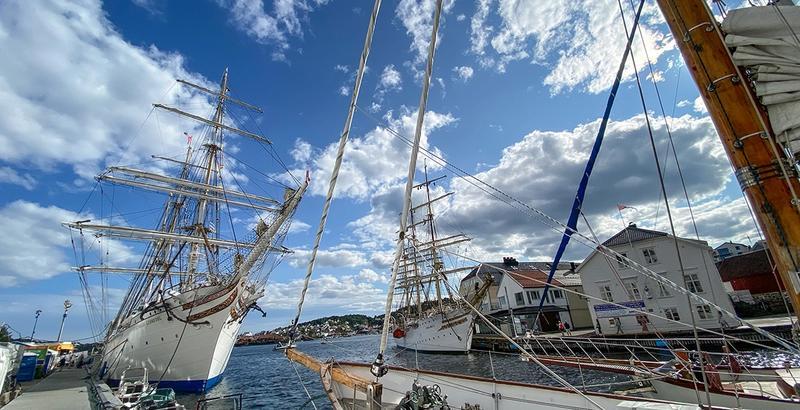 Statsraad Lehmkuhl, left, and Sørlandet, moored in Pollen.