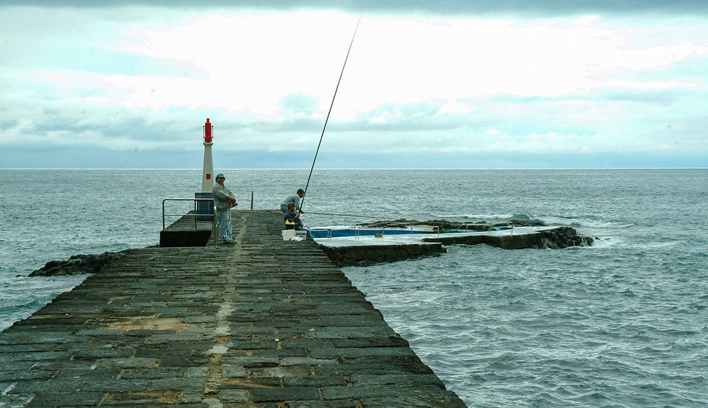 Fishing from a pier on São Miguel Island. Photo: Ronald Toppe